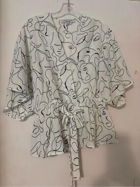 Sweet Rain White Blouse with Black Abstract Face Print and Tie Waist